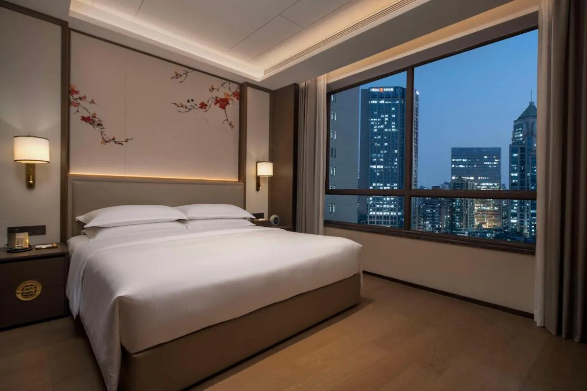 Image 1 of Yuexiu Hotel Guangzhou Curio Collection By Hilton – Free shuttle between hotel and Exhibition Center during Canton Fair & Exhibitor registration Counter