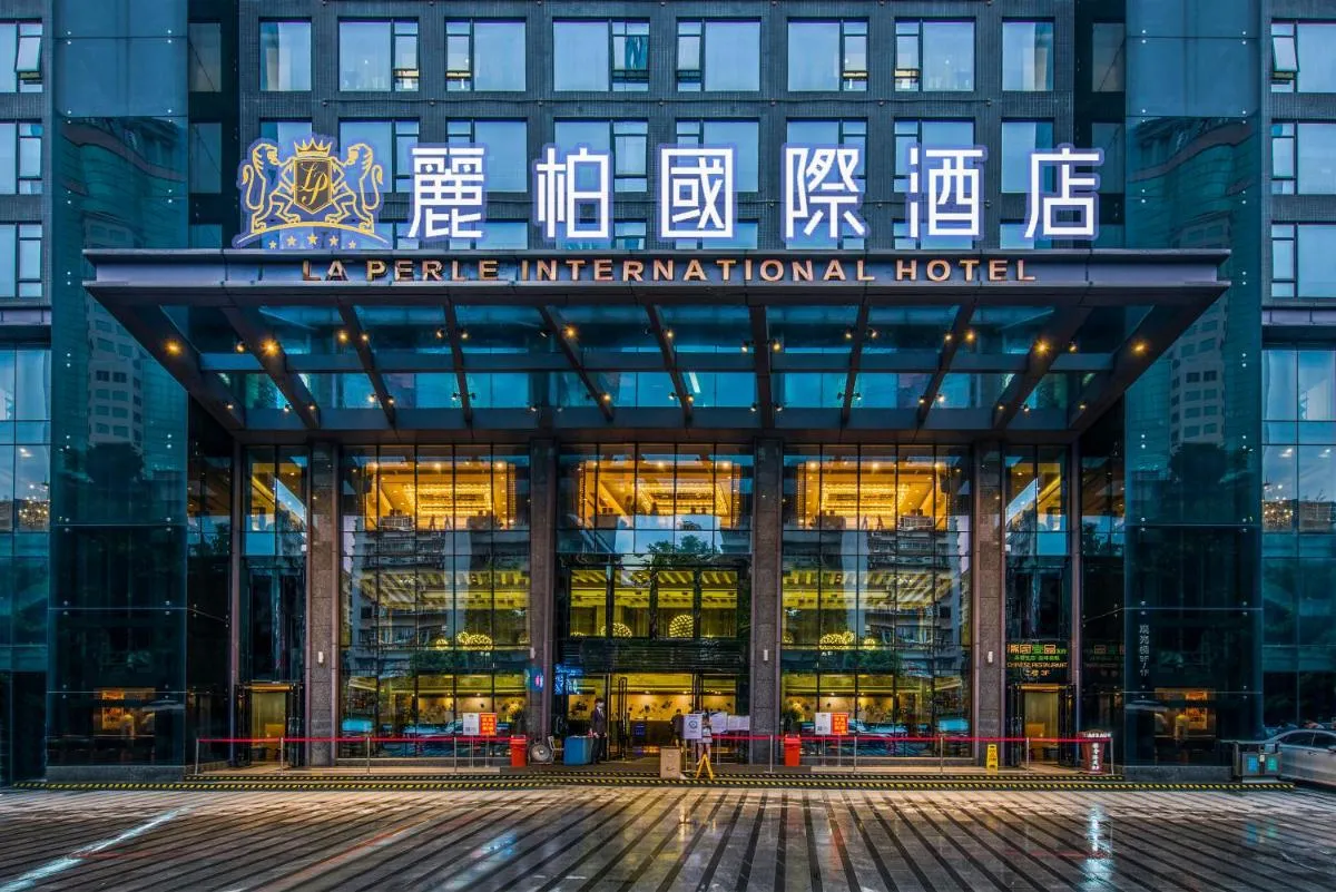 Image 1 of La Perle International Hotel – Free shuttle between hotel and Exhibition Center during Canton Fair & Exhibitor registration Counter